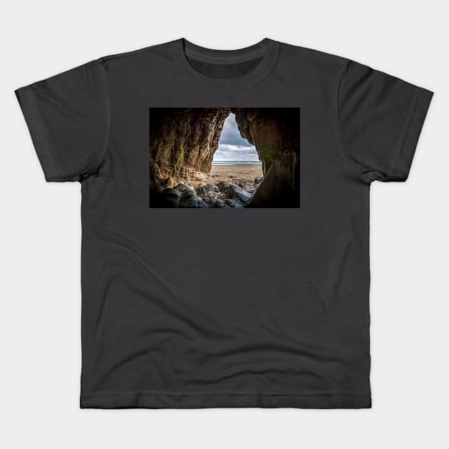 Pendine Sands Cave Kids T-Shirt by tommysphotos